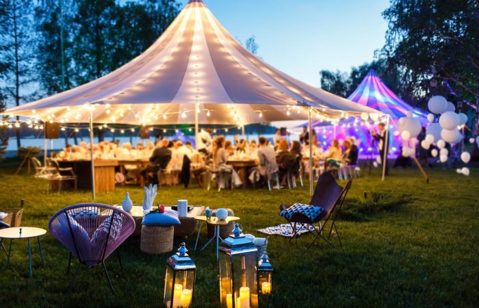 Colourful wedding tents at night
