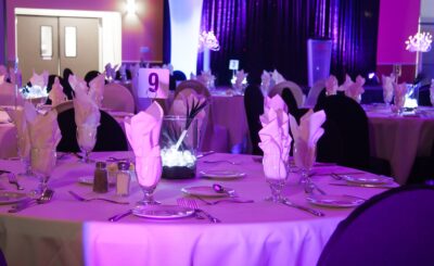 Tables and chairs set up for a prom